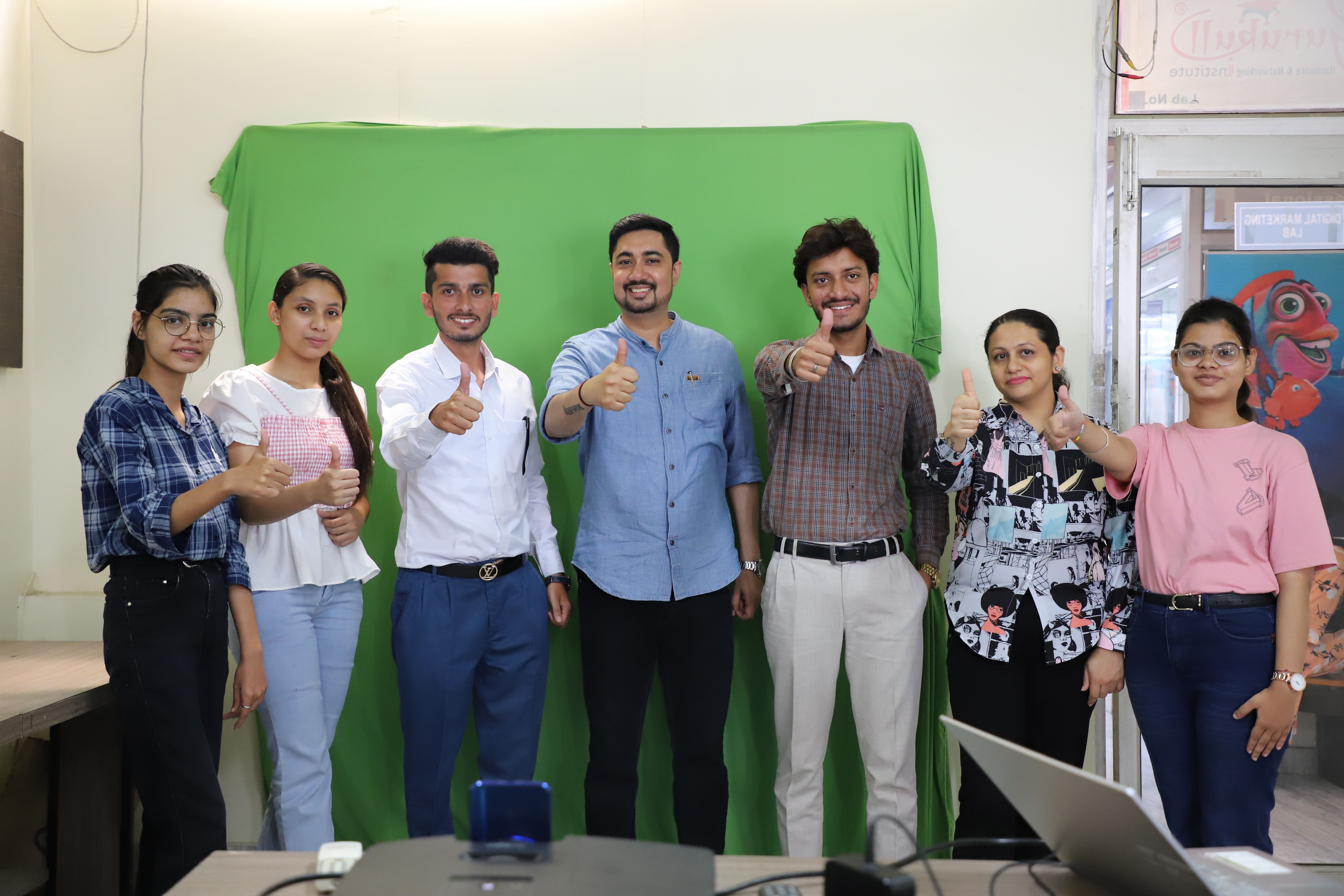 Gurukull Institute Bathinda students with thumbs up after course completion